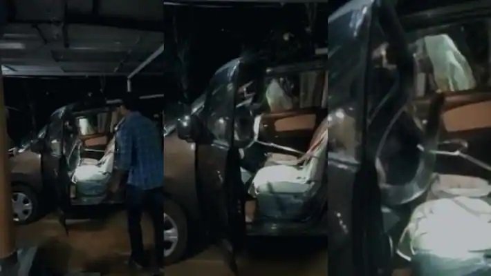 വീട്ടിൽ നിർത്തിയിട്ട കാറിനകത്ത് ഭീമൻ രാജവെമ്പാല; അസാധാരണ ചലനം ശ്രദ്ധിച്ചത് രക്ഷയായി